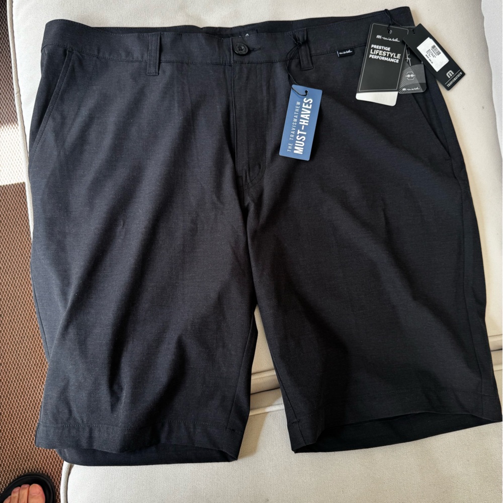 Travis Mathew Black 36x10 NWT